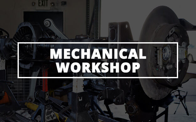 mechanical engine parts in a state of the art facility